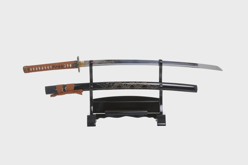 Katana sword with dragon engraving on blade and dragon saya carving. Brown accent colors